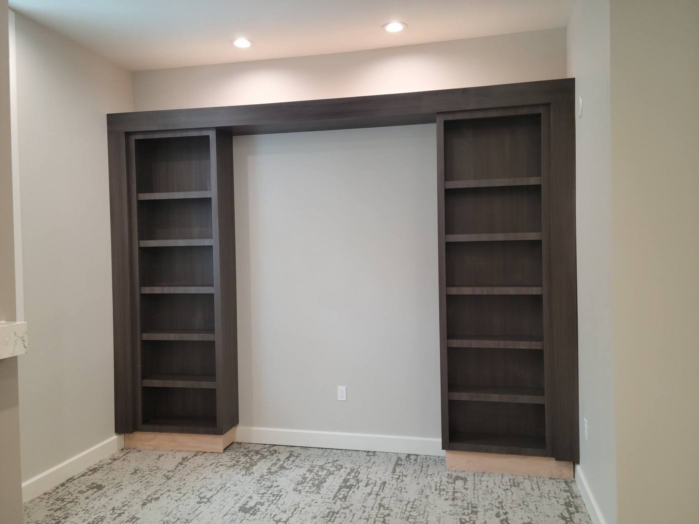 Council On Aging: Built-in shelving wall